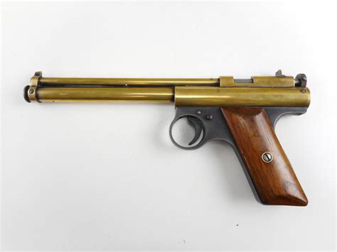 Open the breech by turning the knob at the rear. . Benjamin franklin air pistol model 122
